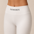 XEMORIX XMRX-099 leggings close-up waistband with centered XEMORIX wordmark