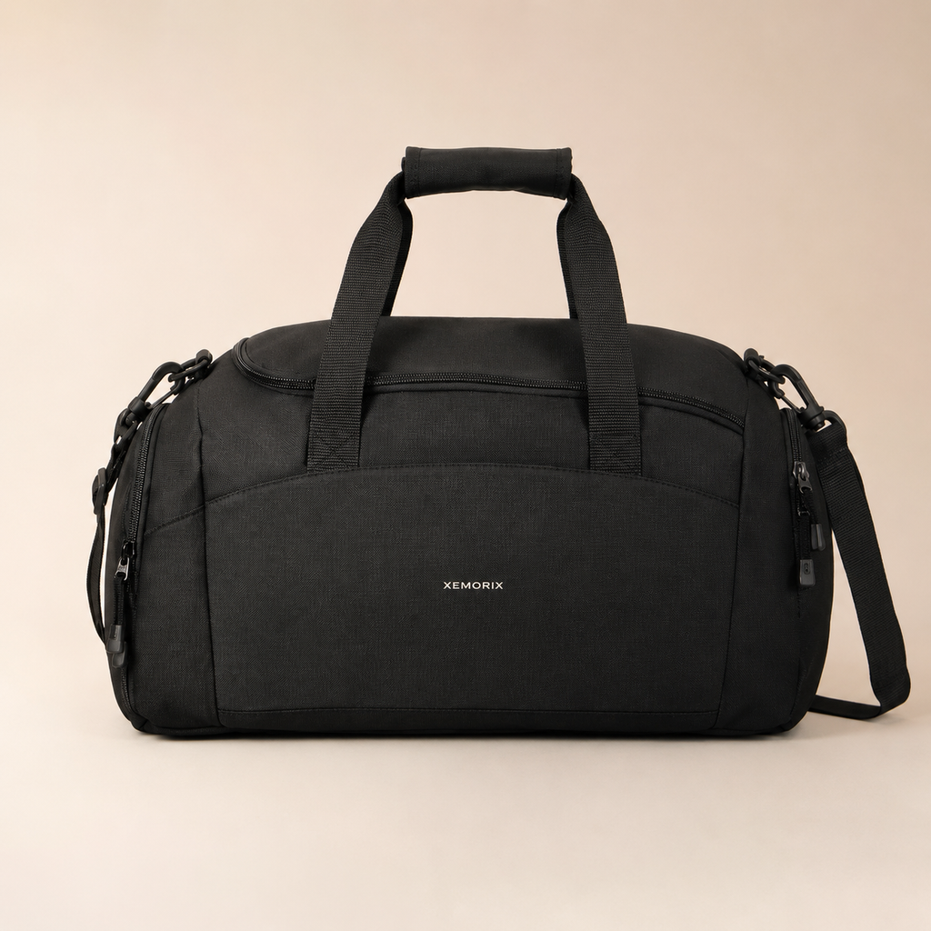 XEMORIX Signature Duffel Bag in Black with centered wordmark, structured travel design, and premium minimalist finish
