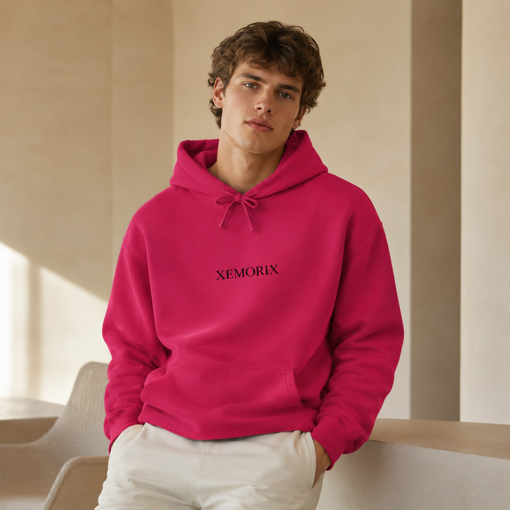 XEMORIX XMRX-070 magenta minimalist hoodie with centered logo on a beige luxury background