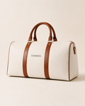 XEMORIX XMRX-024 Signature Weekender Bag in white with brown handles, centered wordmark, and premium travel duffel design