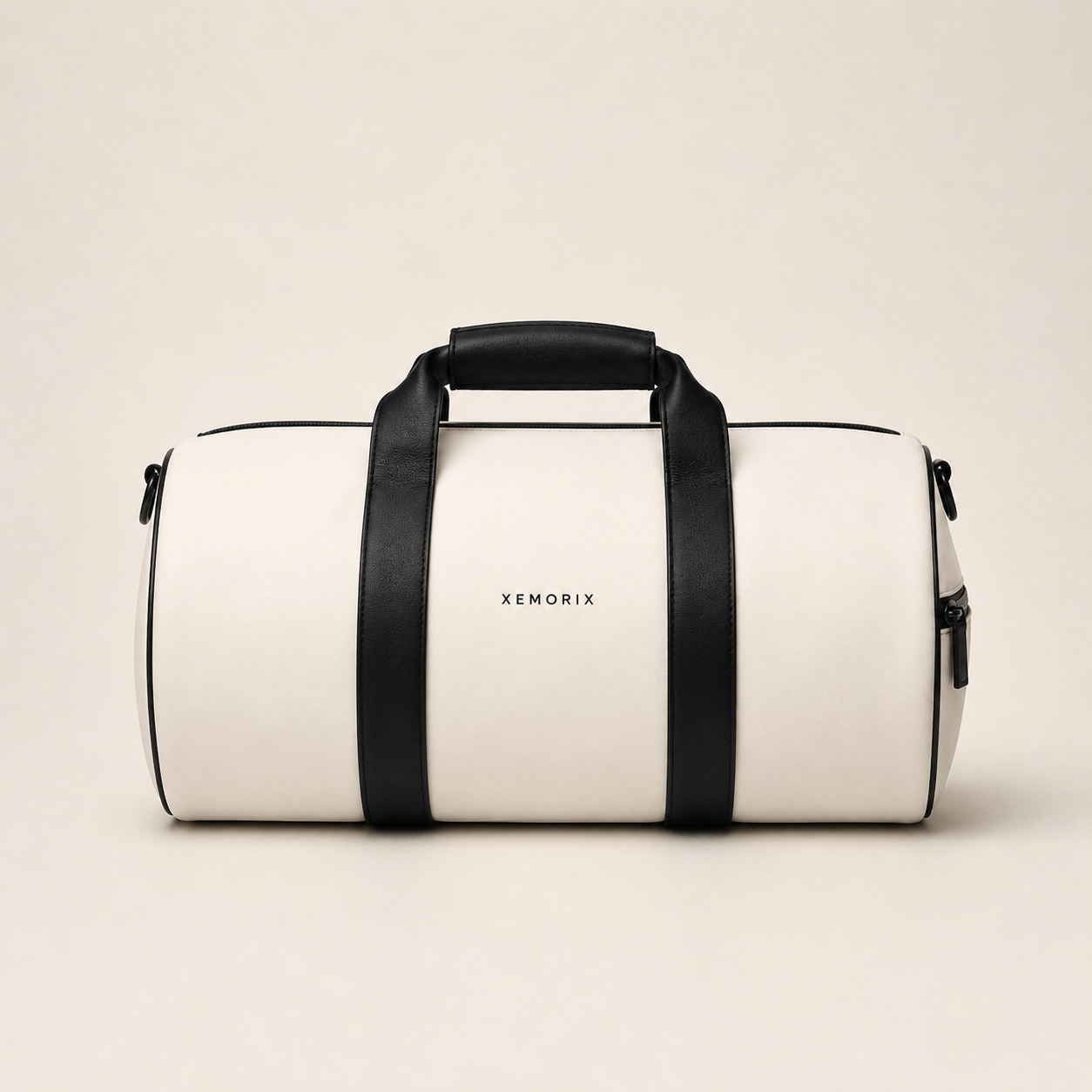 White and black XEMORIX Signature Duffel Bag with centered logo, black straps, zipper pocket, and luxury travel design.