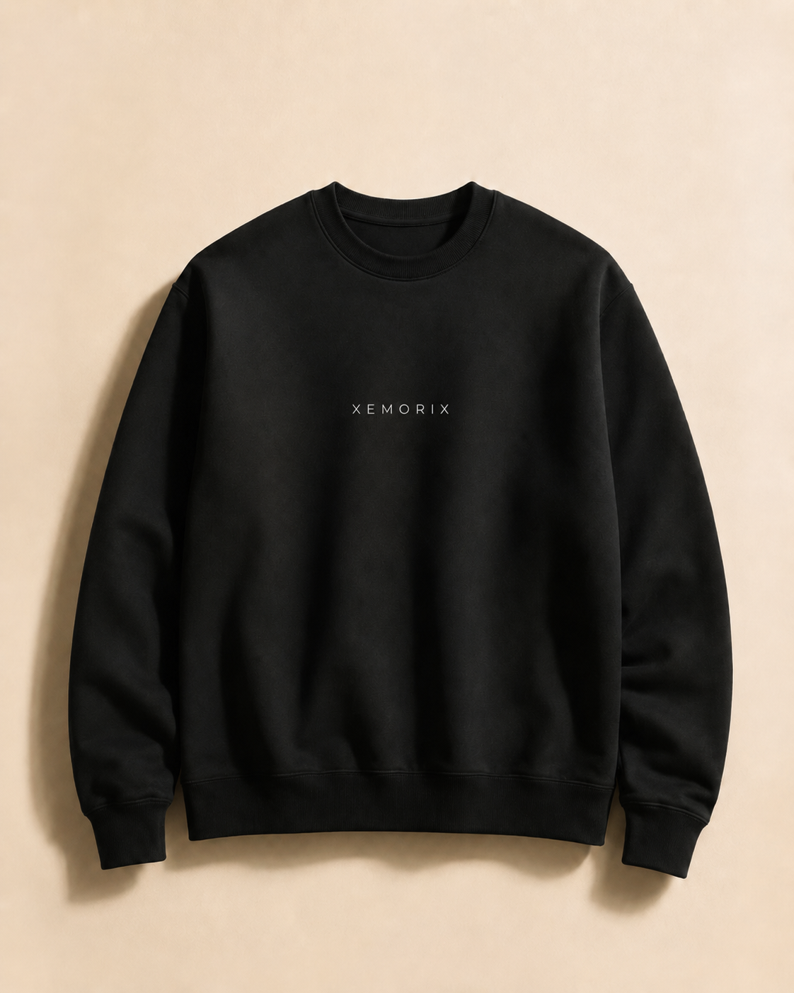 XEMORIX XMRX-037 black signature sweatshirt with centered logo on beige luxury background