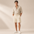 XEMORIX XMRX-074 Signature Lounge Shorts in cream with centered premium branding on a beige background