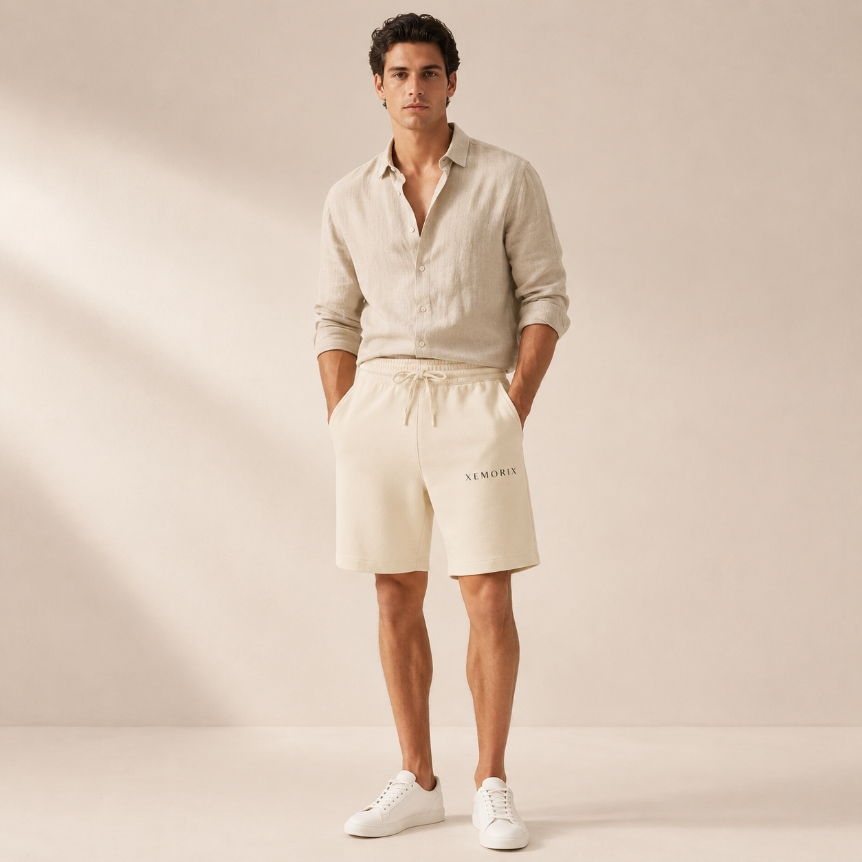 XEMORIX XMRX-074 Signature Lounge Shorts in cream with centered premium branding on a beige background